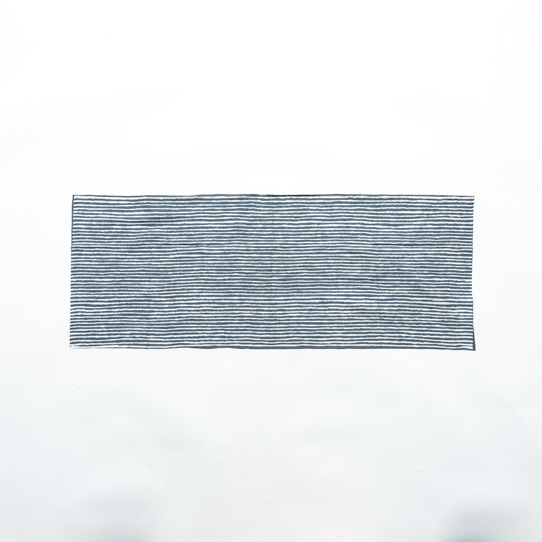 Gray hand towel with vertical white stripes, laid flat for full view.