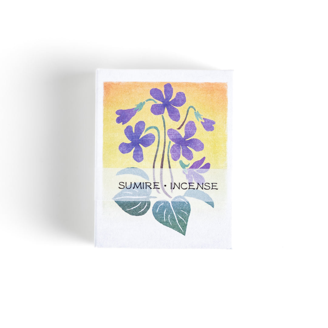 Incense featuring deep violet sticks in a box adorned with a delicate violet flower illustration, offering a floral and soothing fragrance for relaxation.