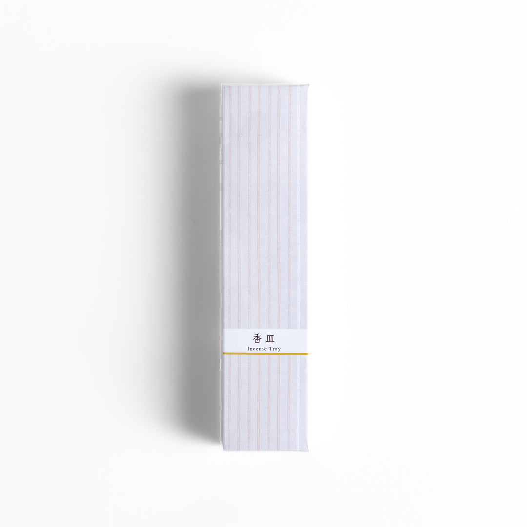 Incense Holder elegantly packaged in a minimalist white box with subtle vertical stripes and a clean white label, designed for a refined and serene incense-burning experience.