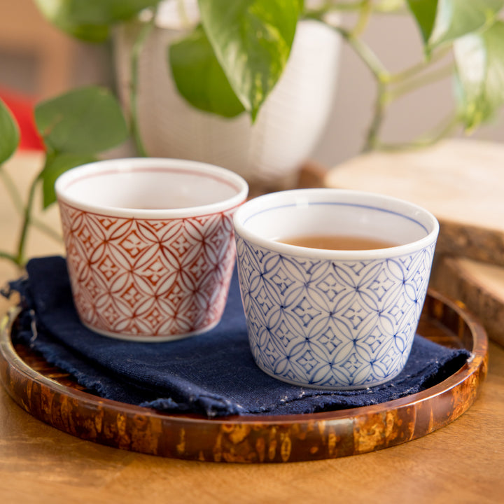 Beautifully patterned bowls in red and blue, perfect for serving rice or snacks. Ideal for adding a stylish touch to your dining experience.