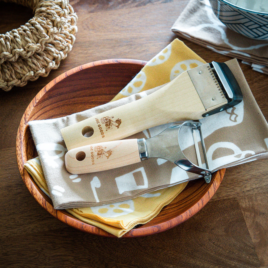 Japanese Wood Handle Peeler and Julienne Peeler Set, featuring ergonomic wooden handles and sharp stainless steel blades, perfect for effortless vegetable peeling and slicing.