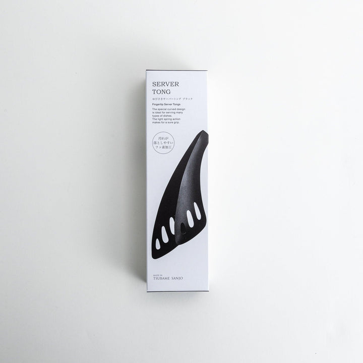 Matte black serving tongs with curved tips and a sturdy design, featuring small holes for draining or straining when serving.