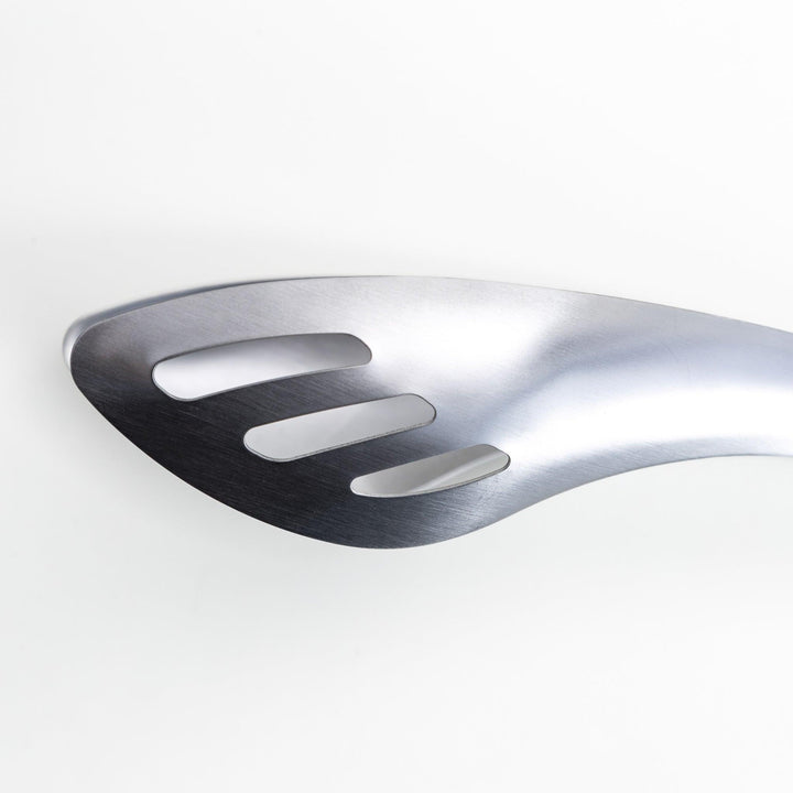 Sleek and modern stainless steel tongs with a slotted spoon end for draining and a solid spoon end for serving, perfect for handling salads, pasta, and other dishes with ease.