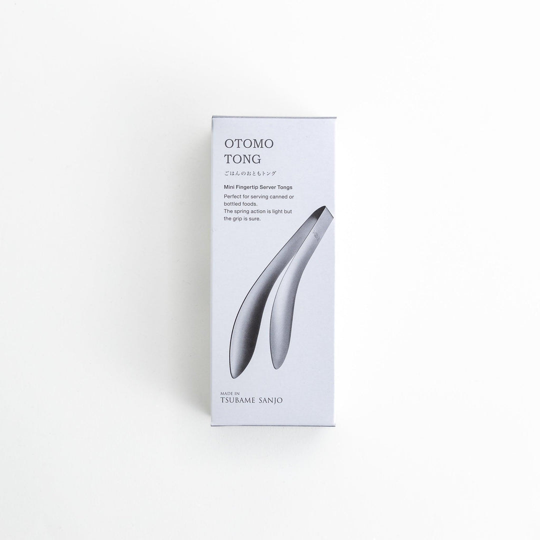 Elegant, curved stainless steel tongs with a sleek design