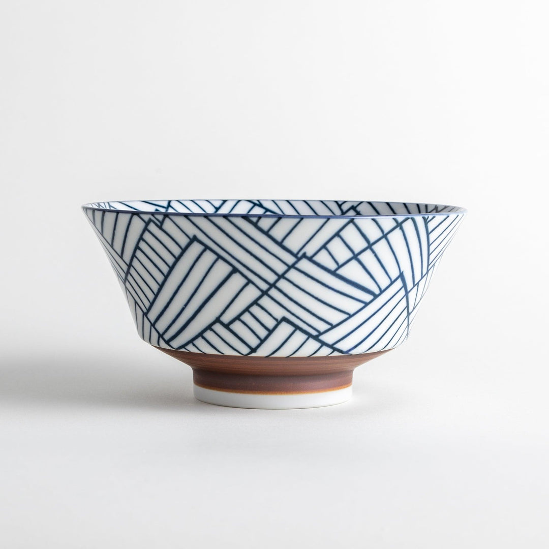 Basket weave patterned bowl with intricate blue geometric lines on a white background, featuring a brown base.