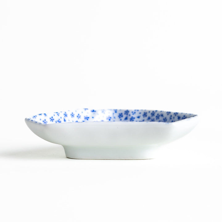 Mt. Fuji-shaped plate with a small blue dotted pattern.