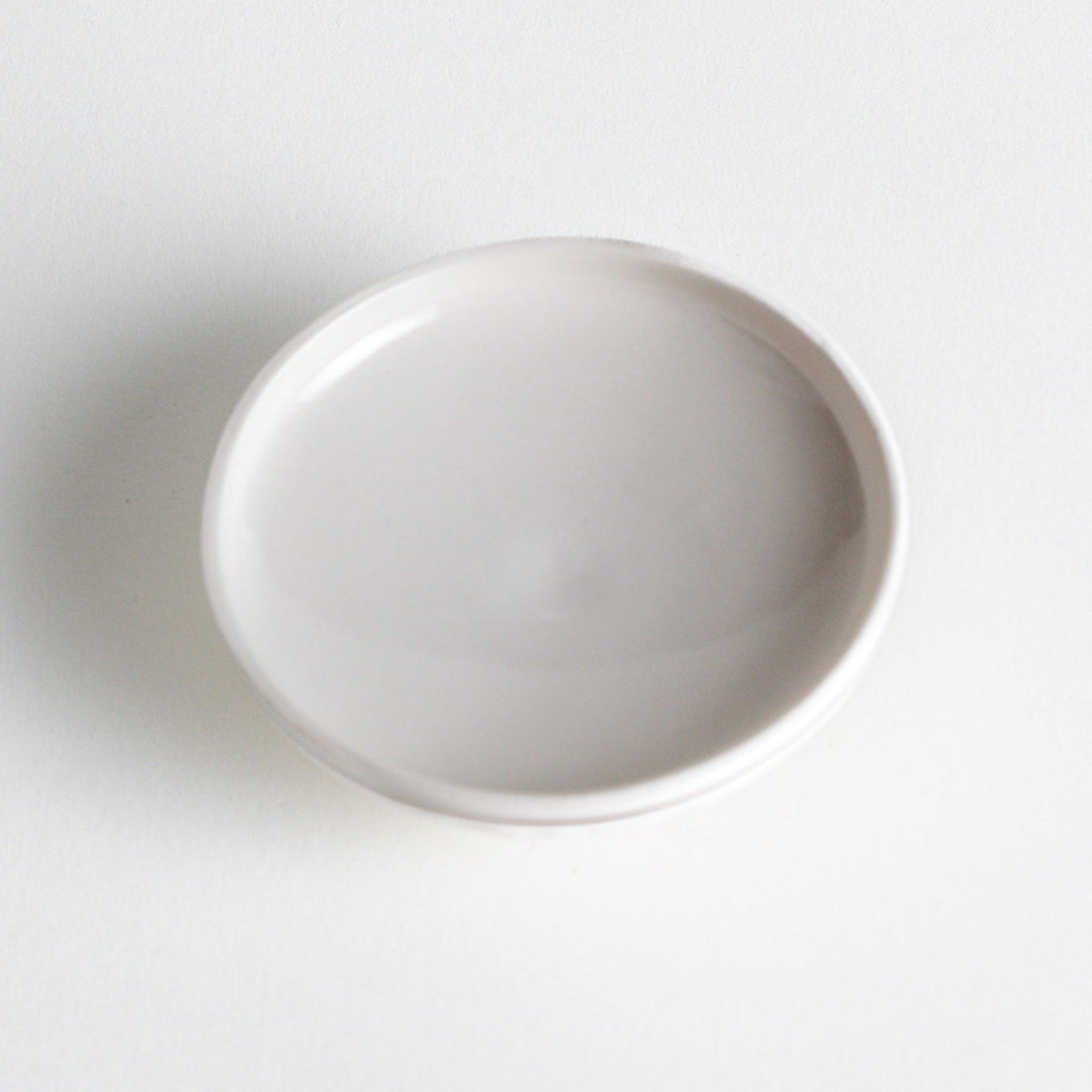 White ceramic chawanmushi bowl with gold trim.