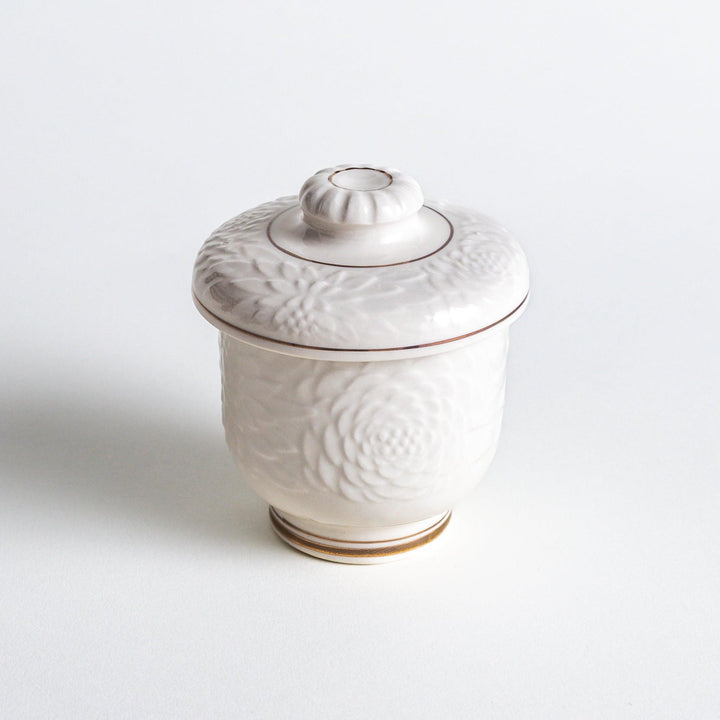 White ceramic chawanmushi bowl with gold trim.