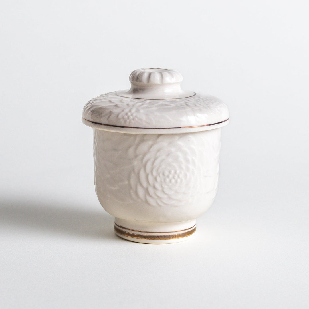 White ceramic chawanmushi bowl with gold trim.