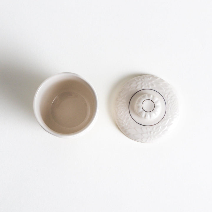 White ceramic chawanmushi bowl with gold trim.