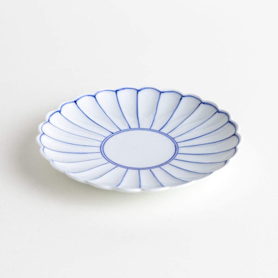 Chrysanthemum salad plates with a striped design, one in blue and the other in red.