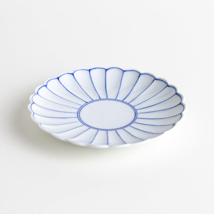 Chrysanthemum salad plates with a striped design, one in blue and the other in red.