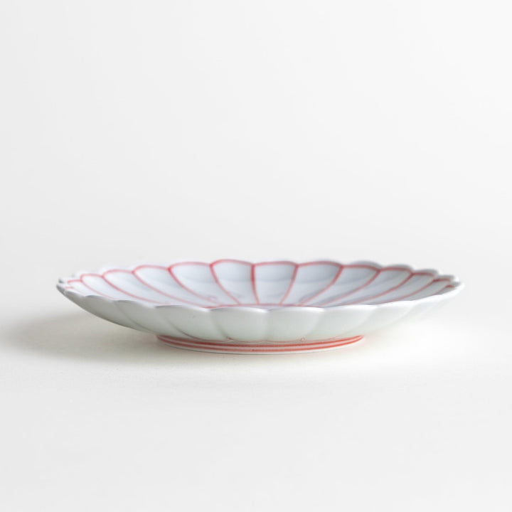 Chrysanthemum salad plates with a striped design, one in blue and the other in red.