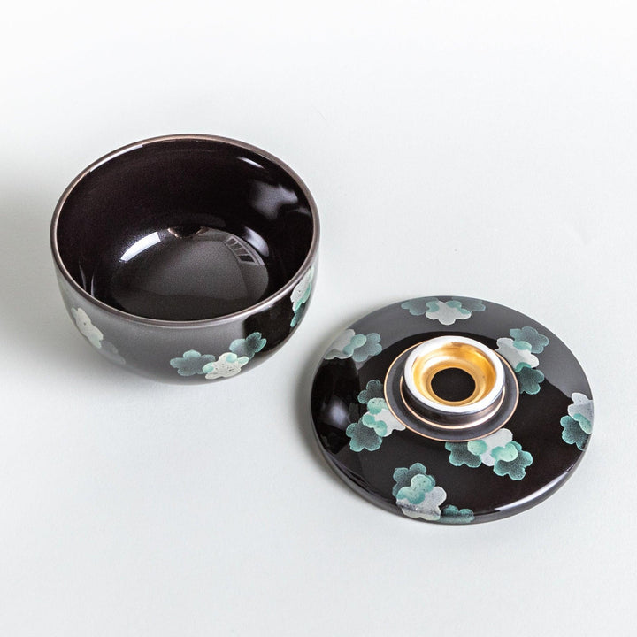 Black chawanmushi bowl with white sakura flower pattern