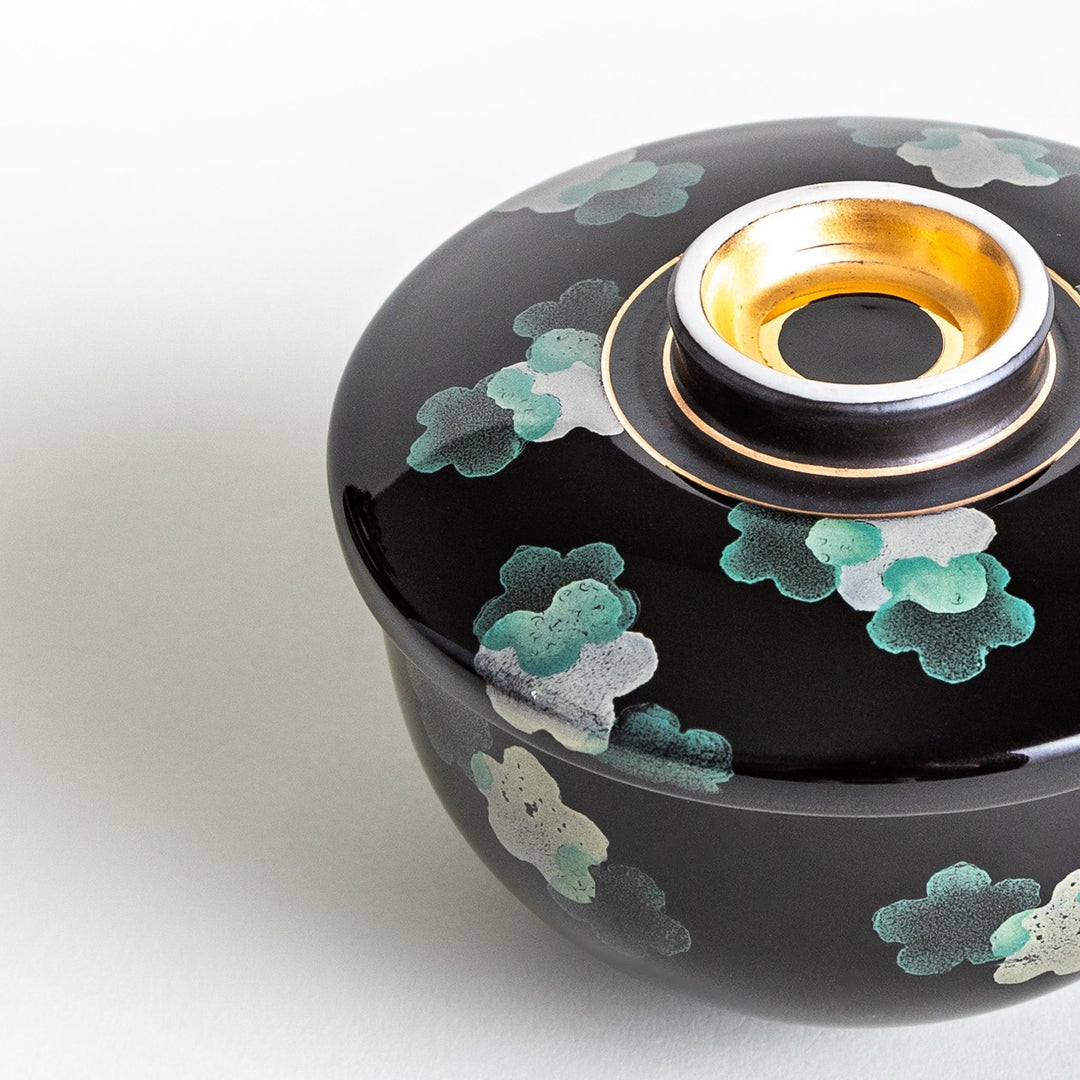 Black chawanmushi bowl with white sakura flower pattern