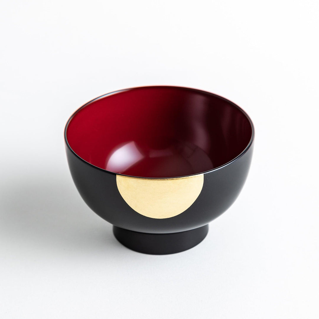 Traditional black lacquer bowl with a golden moon motif on the exterior, featuring a smooth, glossy finish.