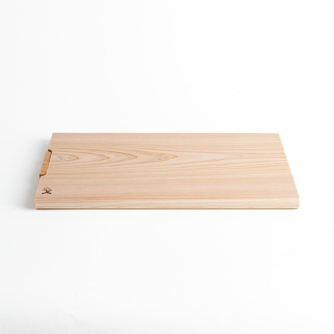 A rectangular hinoki cutting board with a twisting stand.