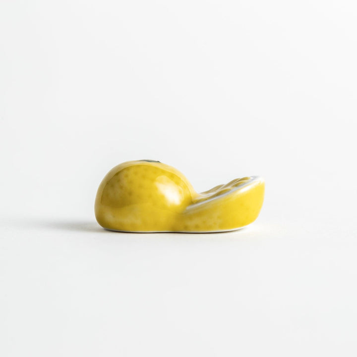 Ceramic chopstick rests shaped like half-cut lemon