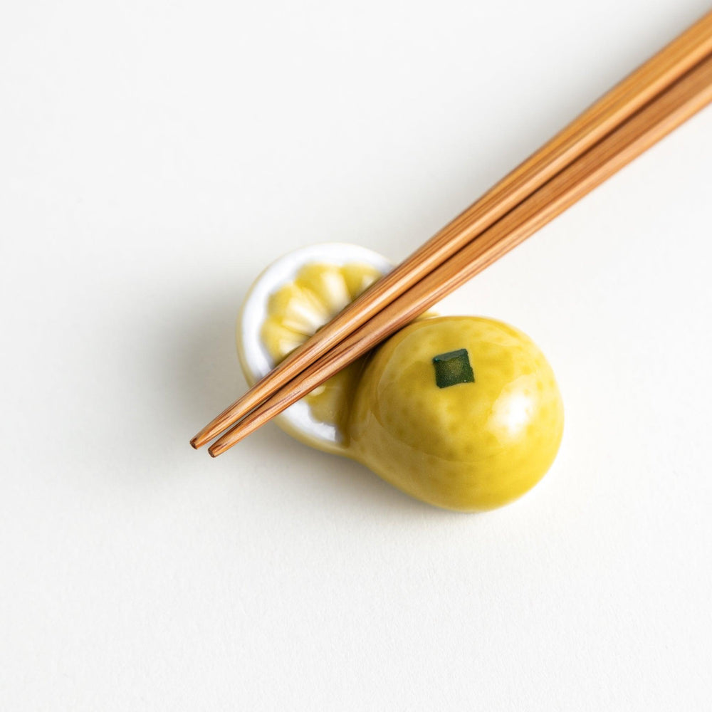 Ceramic chopstick rests shaped like half-cut lemon