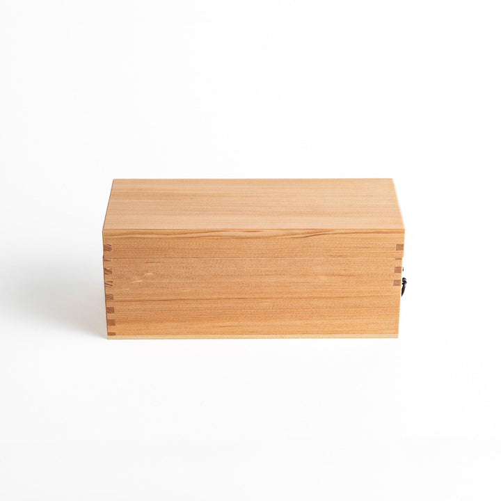 A medium-sized wooden box with a sliding drawer and lid, designed for shaving katsuobushi (dried bonito), with a colorful packaging box featuring traditional Japanese artwork.