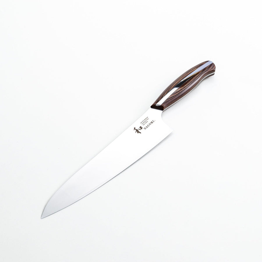 Nagomi chef's knife featuring a stainless steel blade and a sleek wooden handle, displayed on a white background.