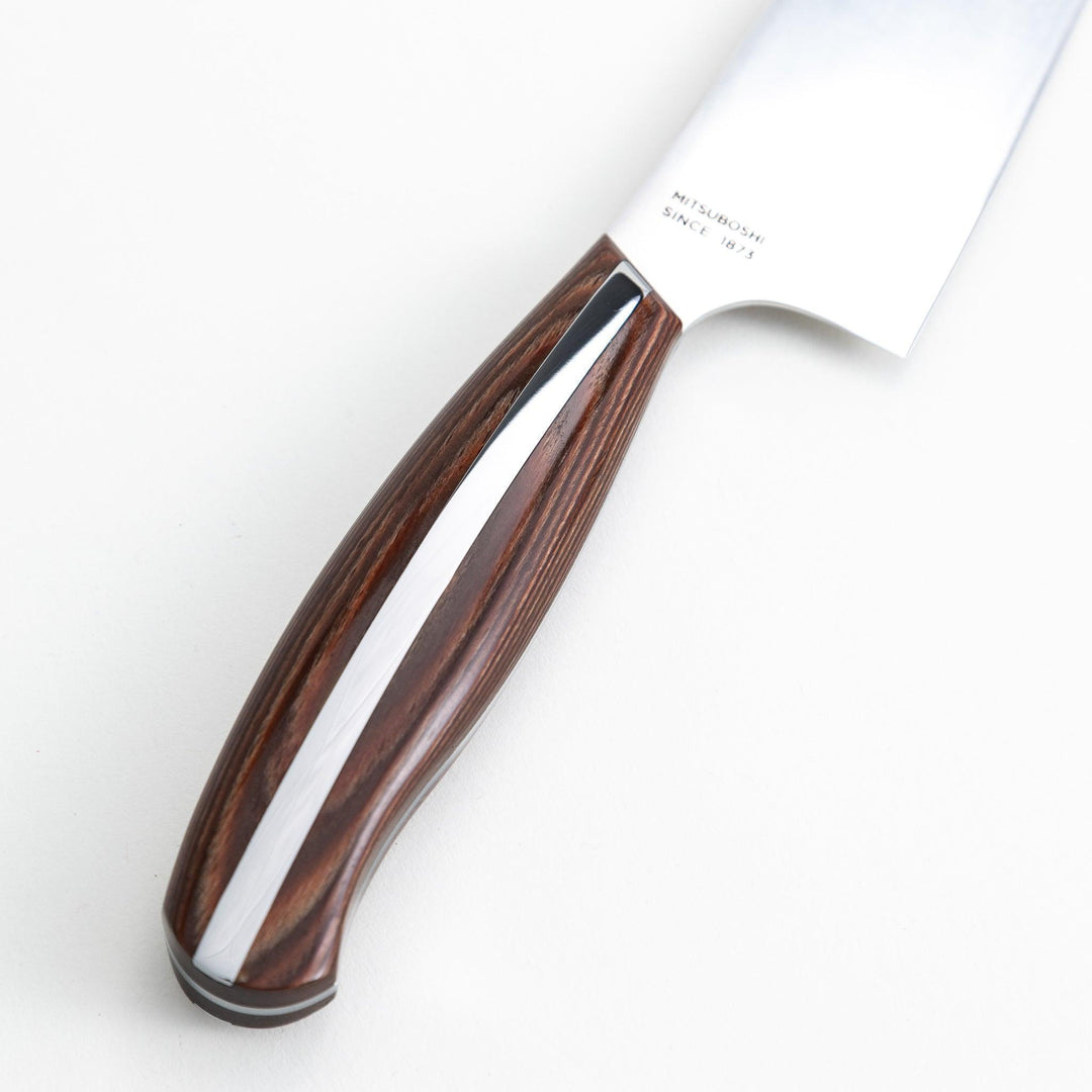 Nagomi Santoku knife with a sharp stainless steel blade and a polished wooden handle, displayed on a white background.