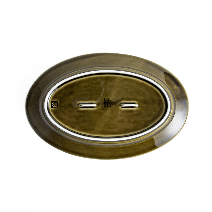 Sleek, dark brown or olive colored oval salad plate with a glossy finish, simple and minimalist.