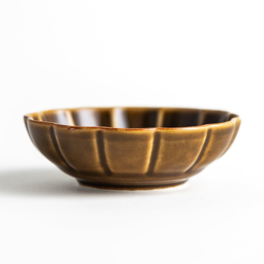 Dessert bowl with scalloped edges and a glossy dark brown or olive color finish.