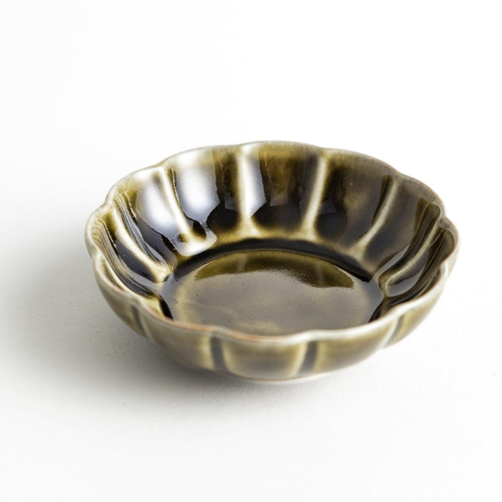 Dessert bowl with scalloped edges and a glossy dark brown or olive color finish.