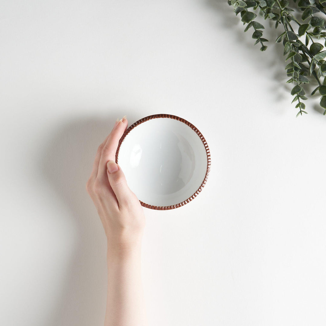 A round white dessert bowl with a rustic scallop-edged border. The border comes in blue, brown, and olive.