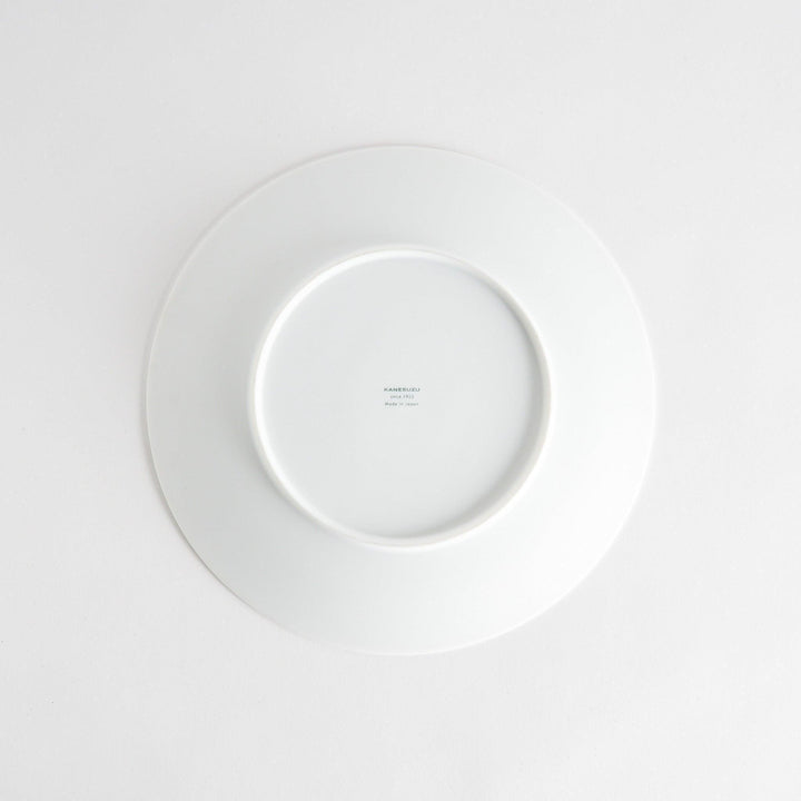 A large, round dinner plate with a soft, speckled white finish.