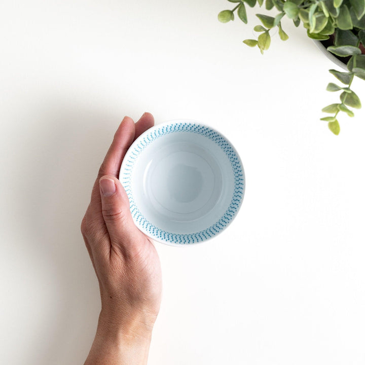 Ceramic condiment bowls, each with a delicate gradient pattern. The bowls are in various pastel colors, including red, green, turkish blue, purple, and blue showcasing their textured design.