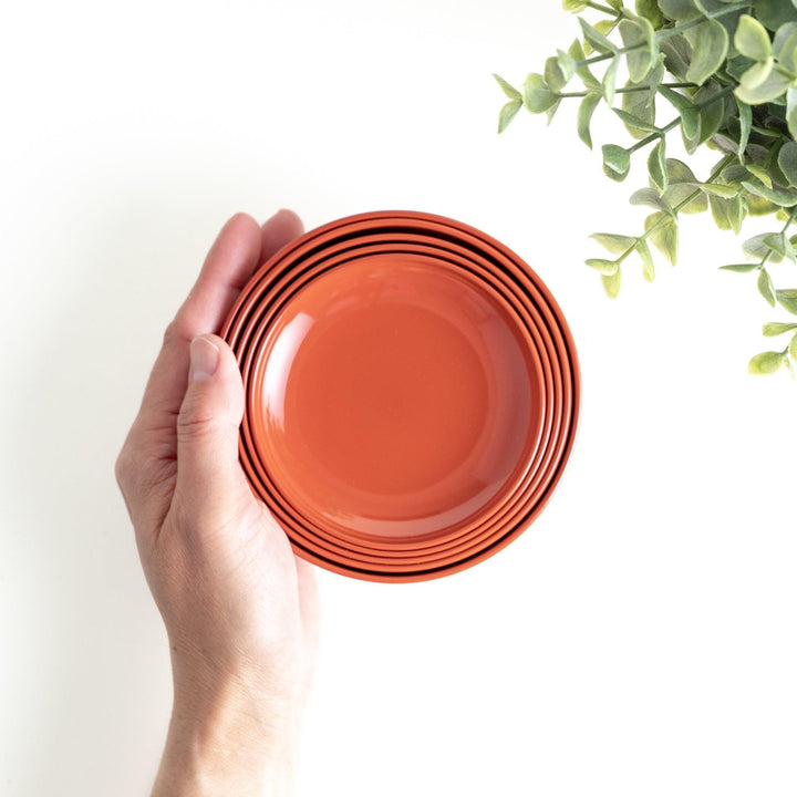 A set of five nested lacquer bowls, commonly used in oryoki meals, representing minimalism and mindfulness. Available in black or red.