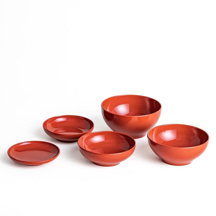 A set of five nested lacquer bowls, commonly used in oryoki meals, representing minimalism and mindfulness. Available in black or red.