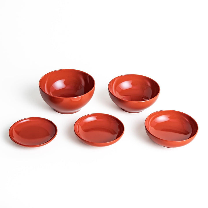 A set of five nested lacquer bowls, commonly used in oryoki meals, representing minimalism and mindfulness. Available in black or red.