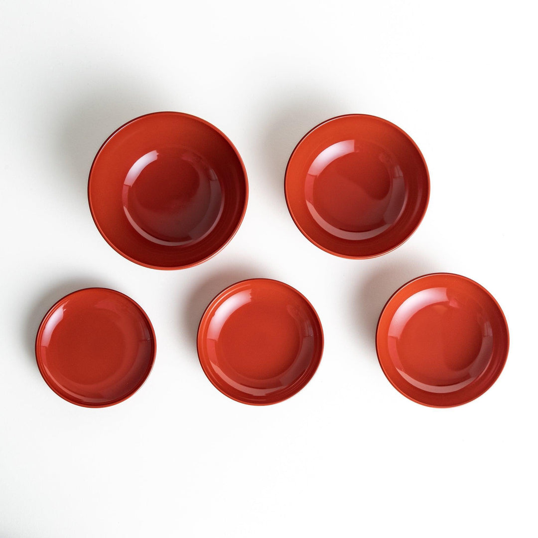 A set of five nested lacquer bowls, commonly used in oryoki meals, representing minimalism and mindfulness. Available in black or red.